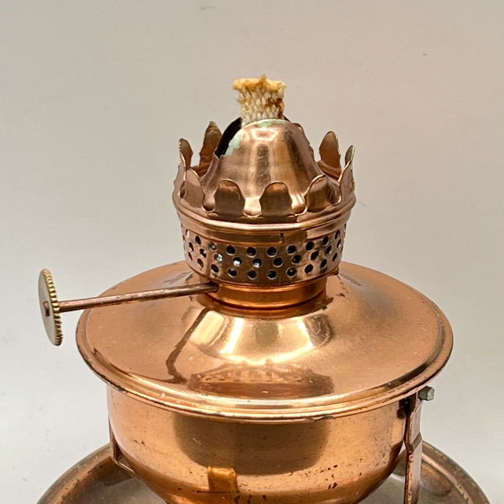 A vintage copper miniature chamber oil lamp featuring a round dish saucer base with a finger loop handle and a crown burner gallery with cotton wick. - Photo 7
