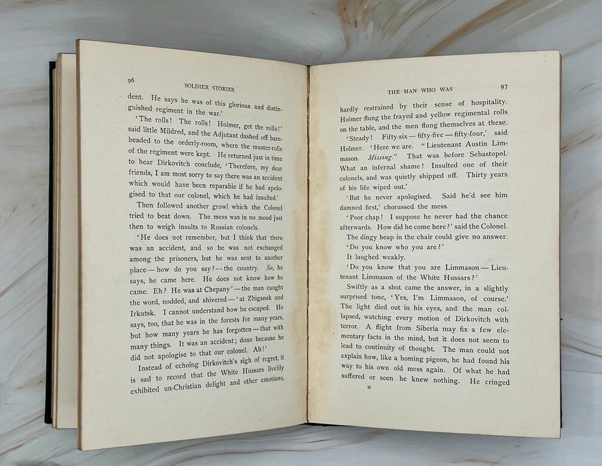 Dark green cloth hardcover book titled Soldier Stories by Rudyard Kipling featuring elaborate gilt embossed lettering, framed story titles, and wildlife illustrations. - Photo 9