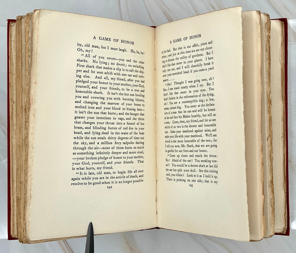 Antique red cloth hardcover book titled The Ape, the Idiot & Other People by W. C. Morrow, featuring an ornate gilt-stamped mythical dragon and gold lettering. - Photo 7