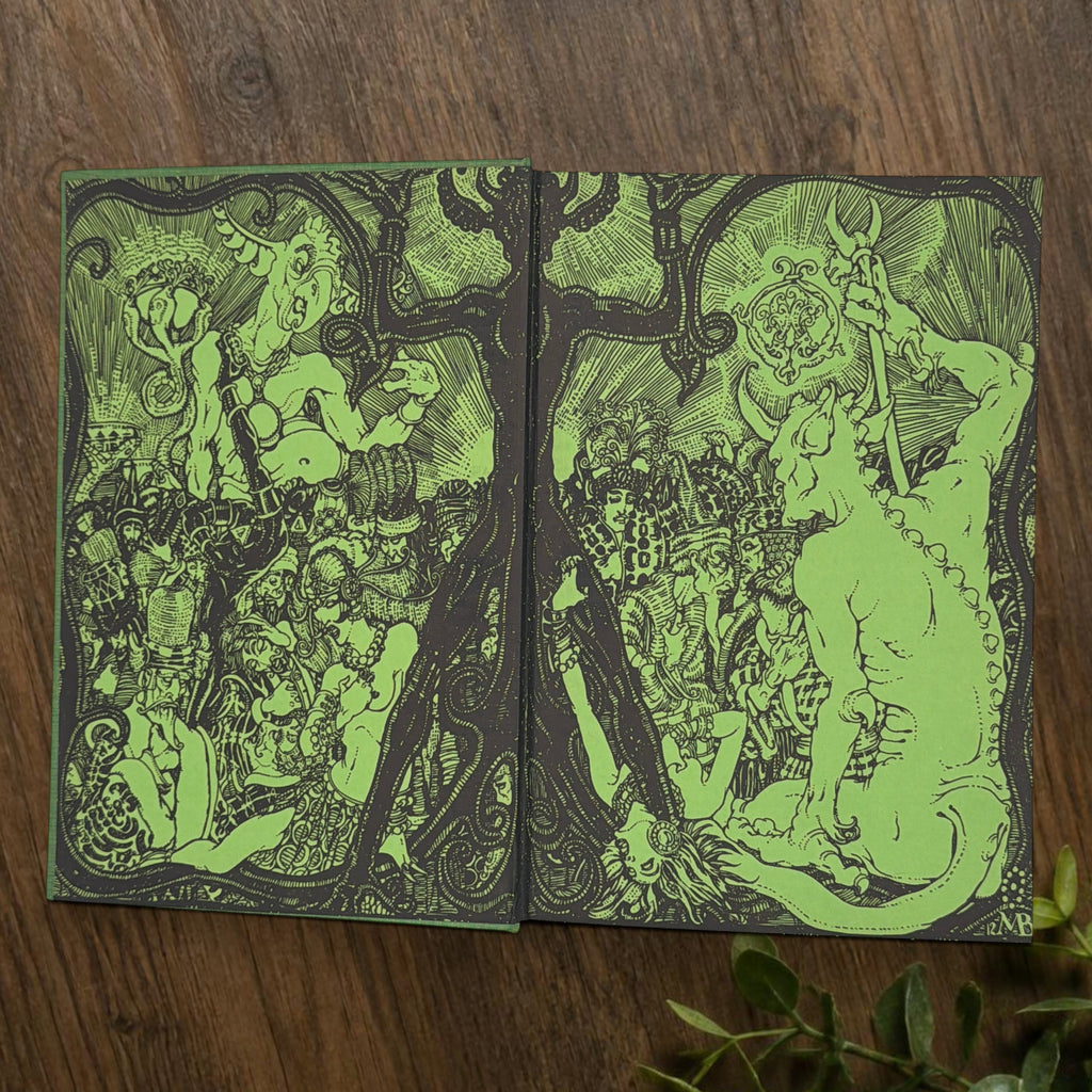 Front cover of the 1928 hardcover edition of Vathek bound in textured green book cloth, resting upright on a dark natural wood surface. - Photo 4