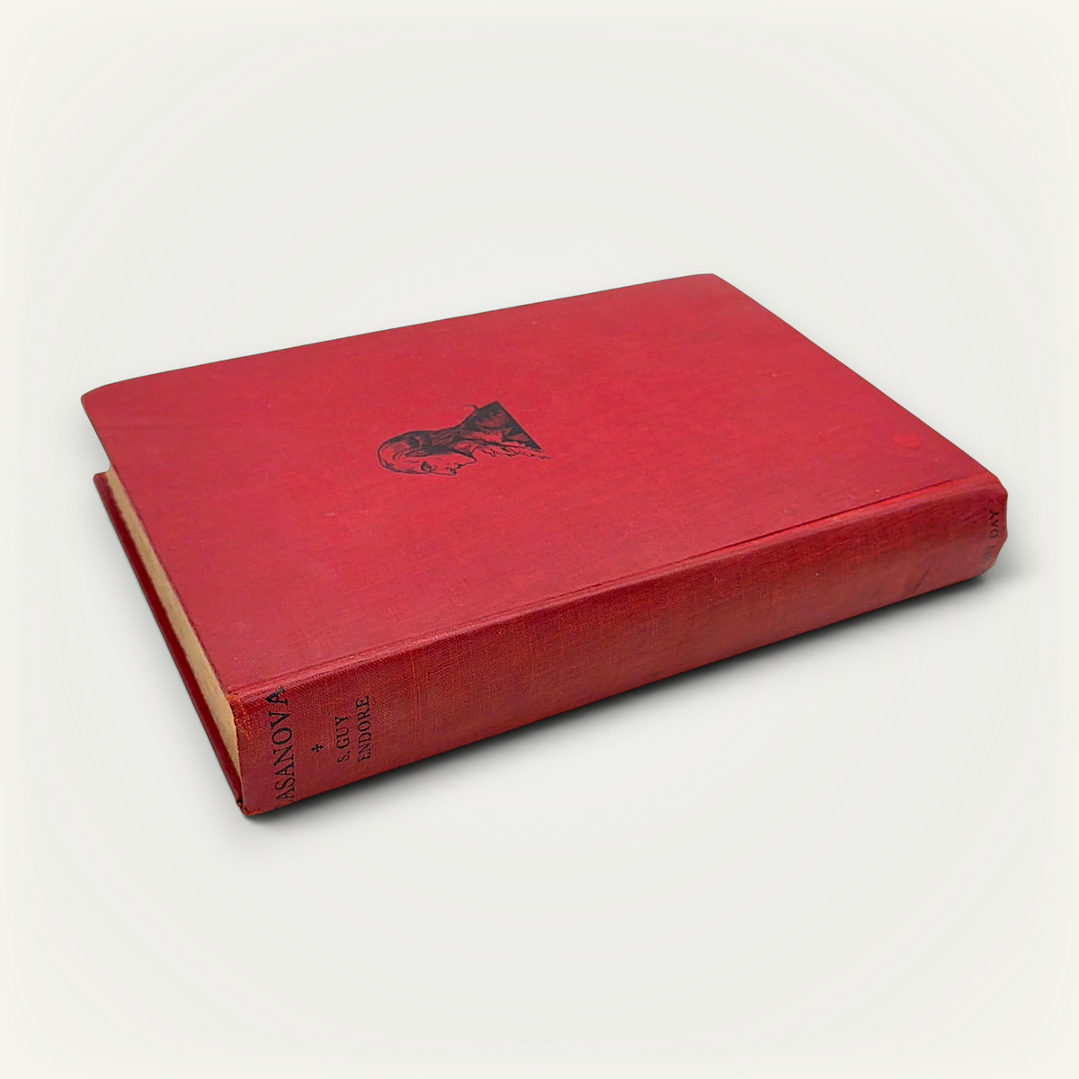 Red cloth hardcover edition of Casanova: His Known and Unknown Life, displayed flat showing the woven textile texture and vertical book cloth grain. - Photo 2