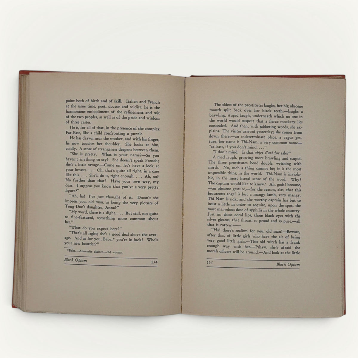 Burnt orange cloth hardcover book standing upright against a neutral background, featuring a minimalist textured cloth front board with black stamped linear accents along the spine edge. - Photo 7