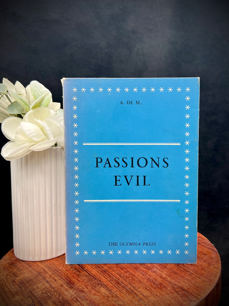 Vintage blue paperbound book titled Passions' Evil by A. de M. published by The Olympia Press, featuring an eight-pointed asterisk border around the front cover. - Photo 1