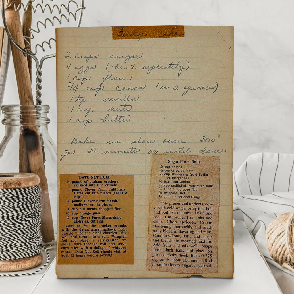 A vintage spiral-bound recipe easel stand featuring an illustration of a tiny chef piloting an antique floral sugar bowl hot air balloon over sugar dunes under a blue sky. - Photo 7