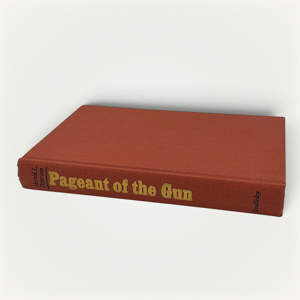 Patina & Prose 1967 first edition hardcover of Pageant of the Gun by Harold L. Peterson with red cloth binding