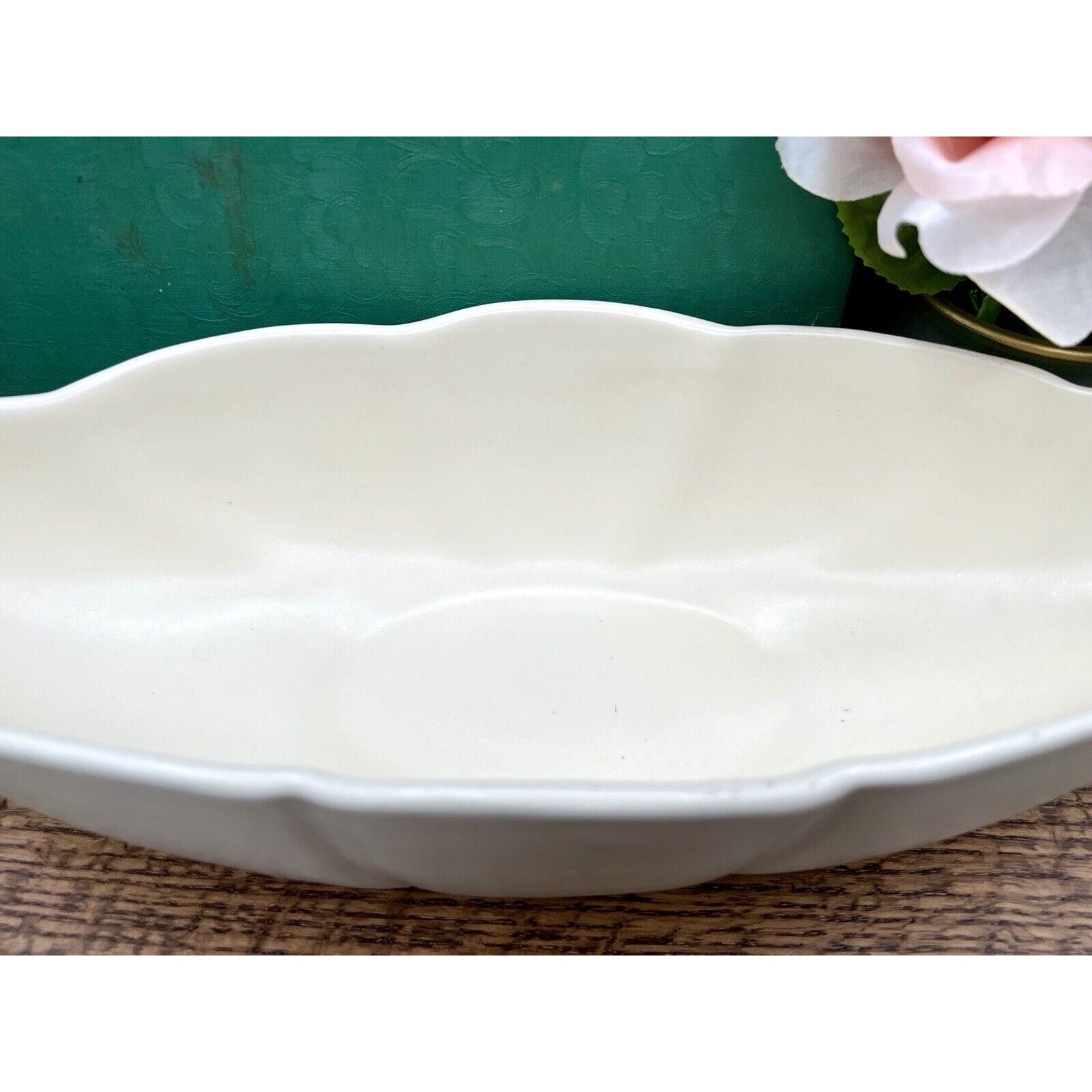 Haeger 3905 oblong ceramic bowl in white, American-made with impressed backstamp and scalloped rim.