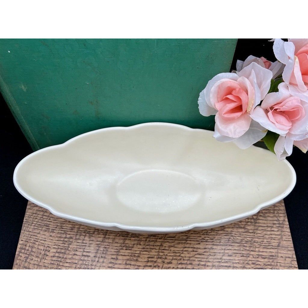 Haeger 3905 oblong ceramic bowl, white with scalloped edge, American-made; 5.5 in long, 13.25 in wide.
