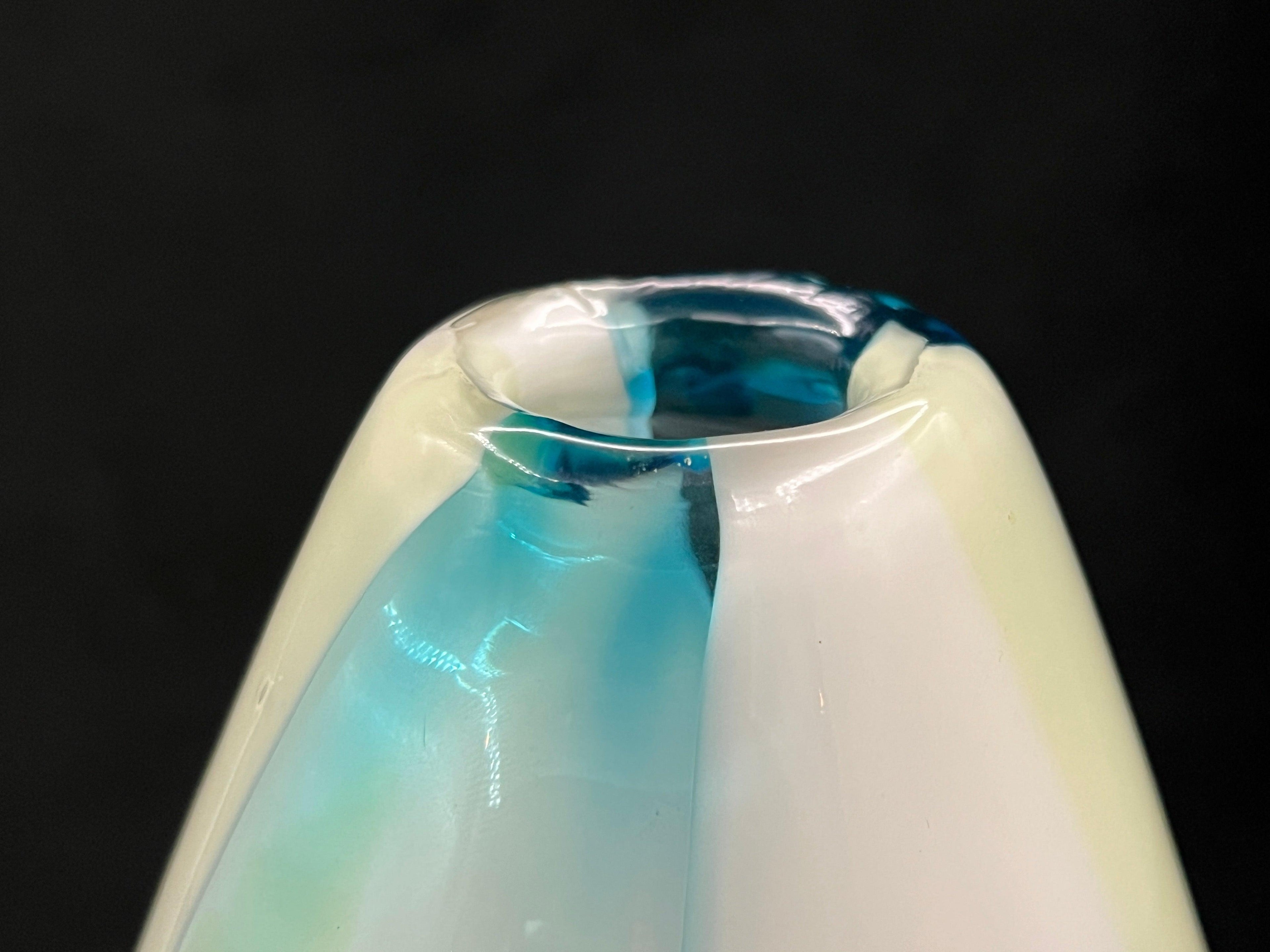 Large Murano art glass vase, three-panel cased white with uranium and aqua blue, rim close-up.