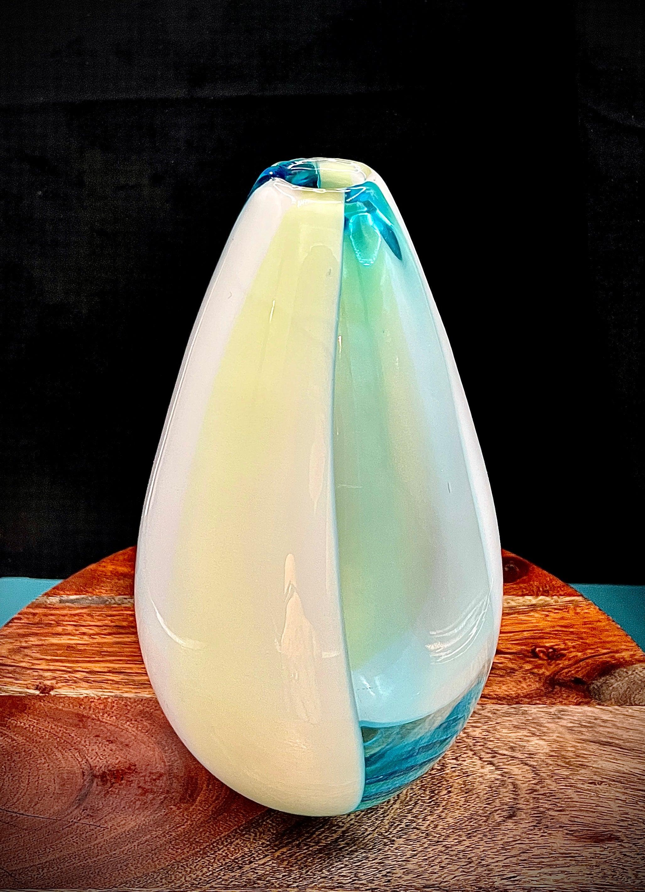 Large Murano glass vase with three-panel blue, white, and uranium-cased glass; attributed to Cenedese, 11.5 inches tall.