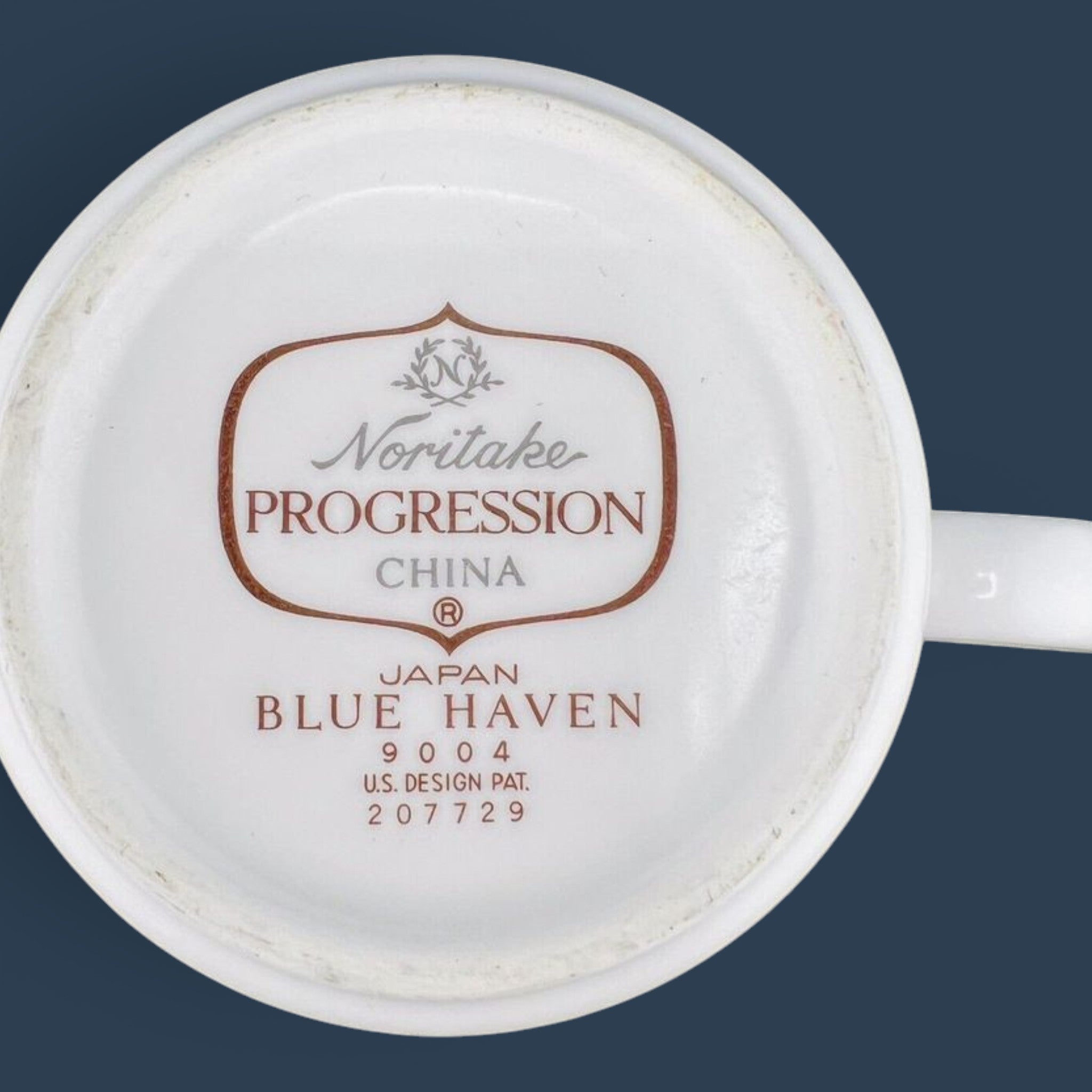 Vintage Noritake Progression Blue Haven cup and saucer set featuring a slate blue mid-century modern floral pattern. - Photo 2