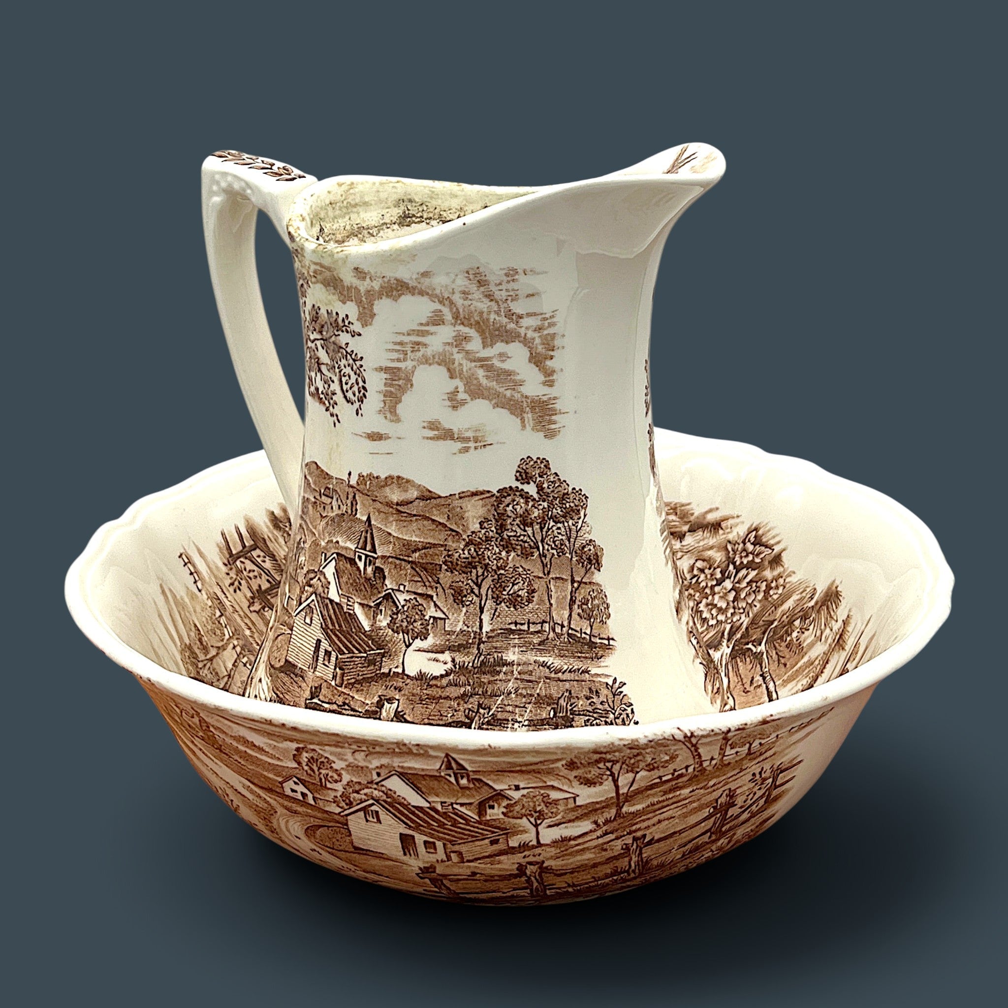 An antique Alfred Meakin brown transferware ceramic pitcher decorated with a detailed countryside landscape and leafy handle motif. - Photo 3