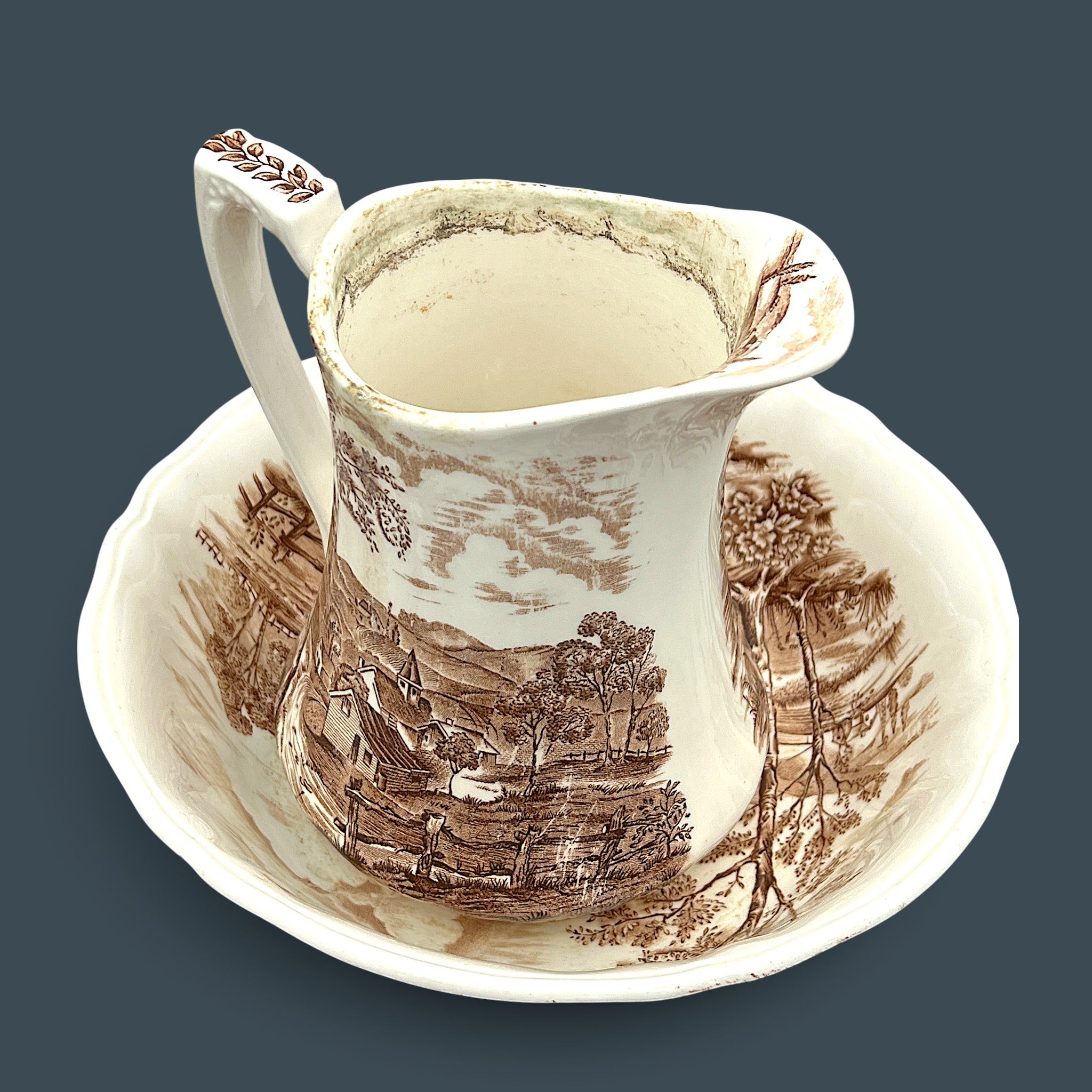 An antique Alfred Meakin brown transferware ceramic pitcher decorated with a detailed countryside landscape and leafy handle motif. - Photo 4