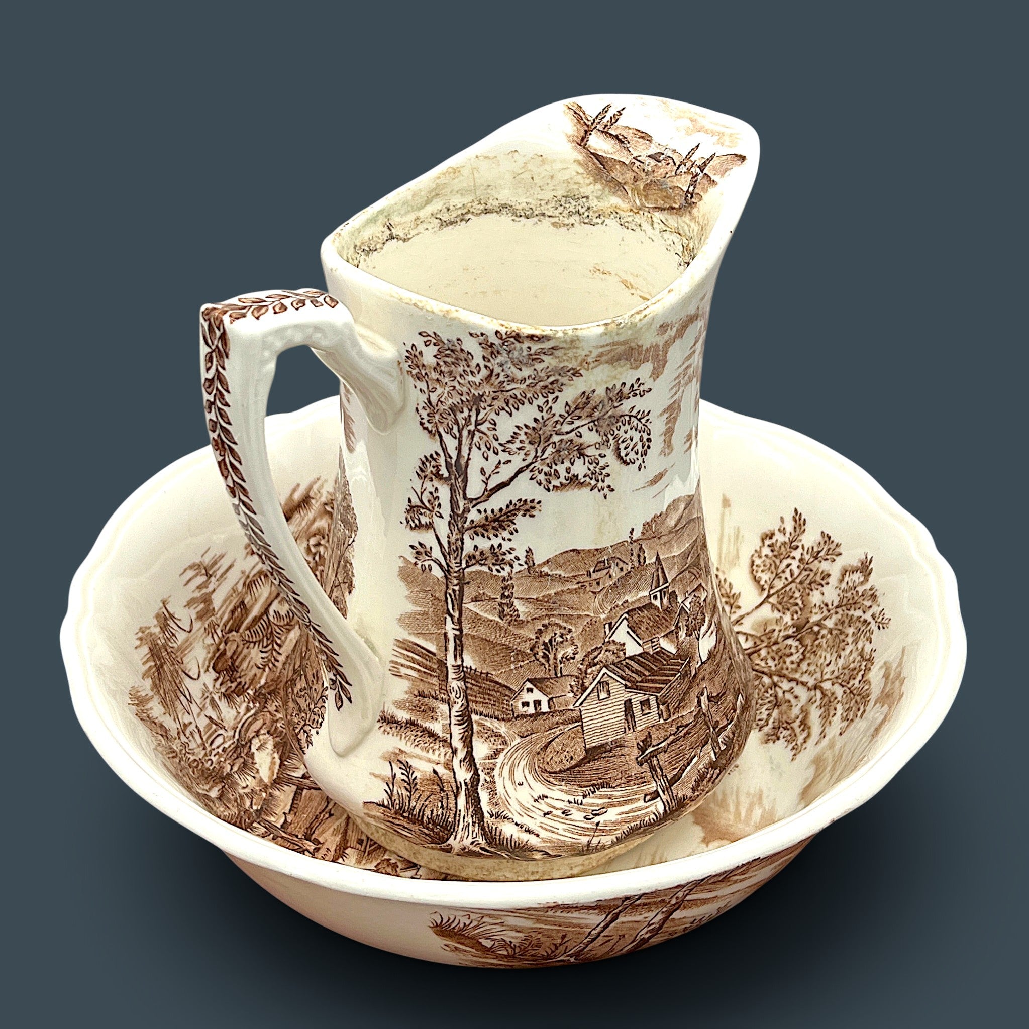 An antique Alfred Meakin brown transferware ceramic pitcher decorated with a detailed countryside landscape and leafy handle motif. - Photo 5