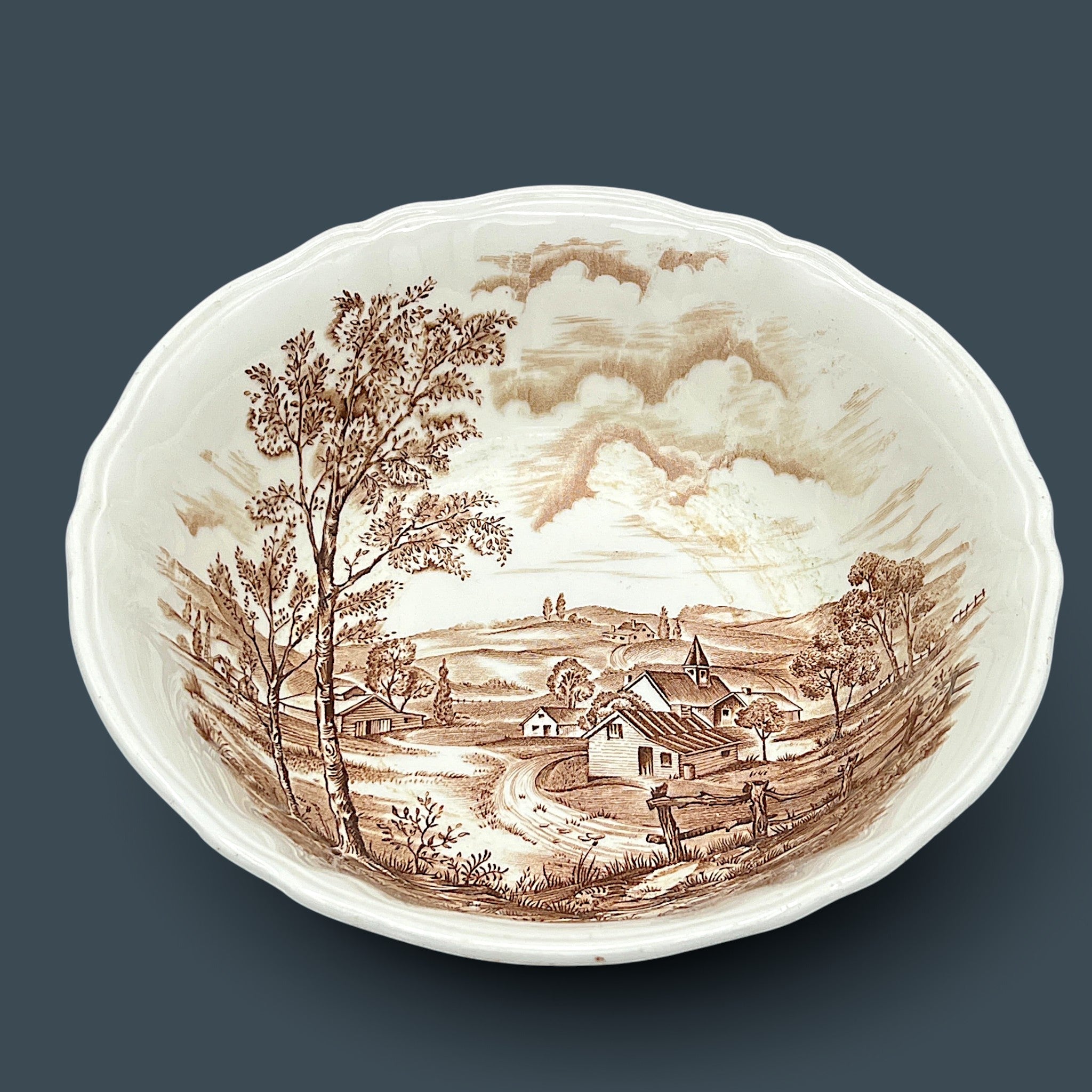 An antique Alfred Meakin brown transferware ceramic pitcher decorated with a detailed countryside landscape and leafy handle motif. - Photo 7