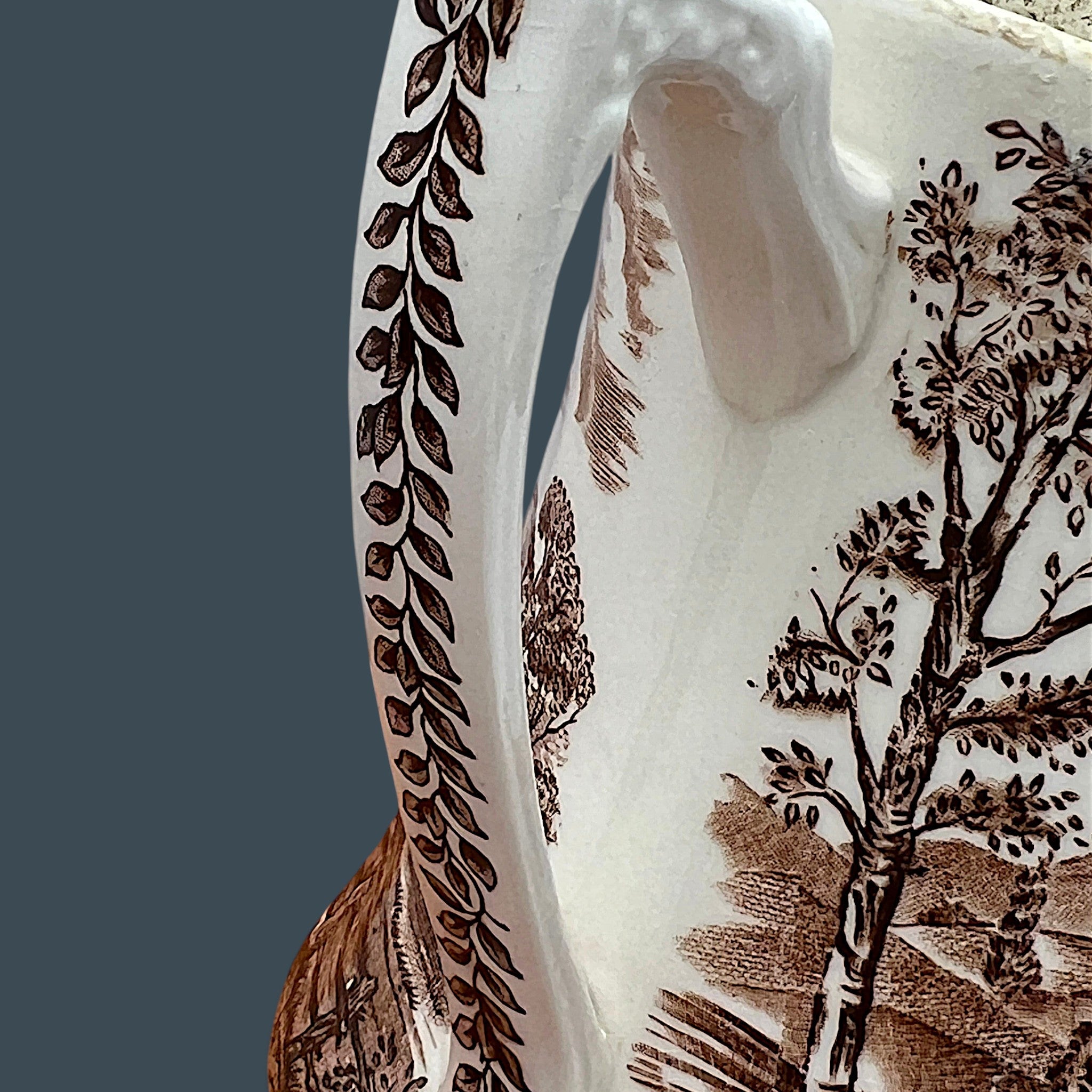 An antique Alfred Meakin brown transferware ceramic pitcher decorated with a detailed countryside landscape and leafy handle motif. - Photo 14
