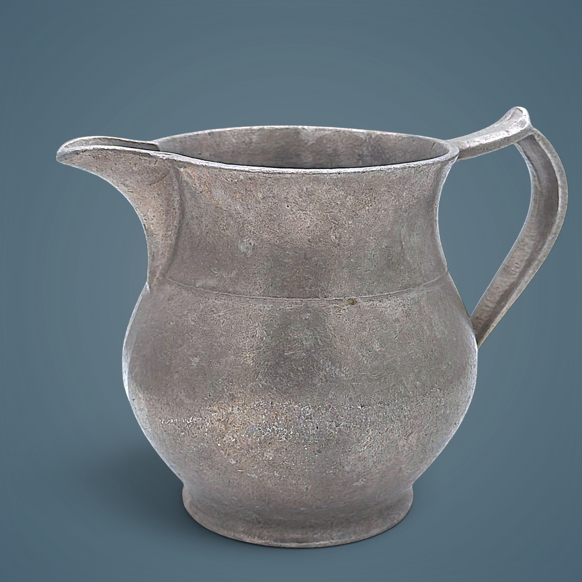 Antique pewter water pitcher in soft gray metal featuring an open flared spout, a bulbous waist with a raised decorative band, and a curved handle. - Photo 2
