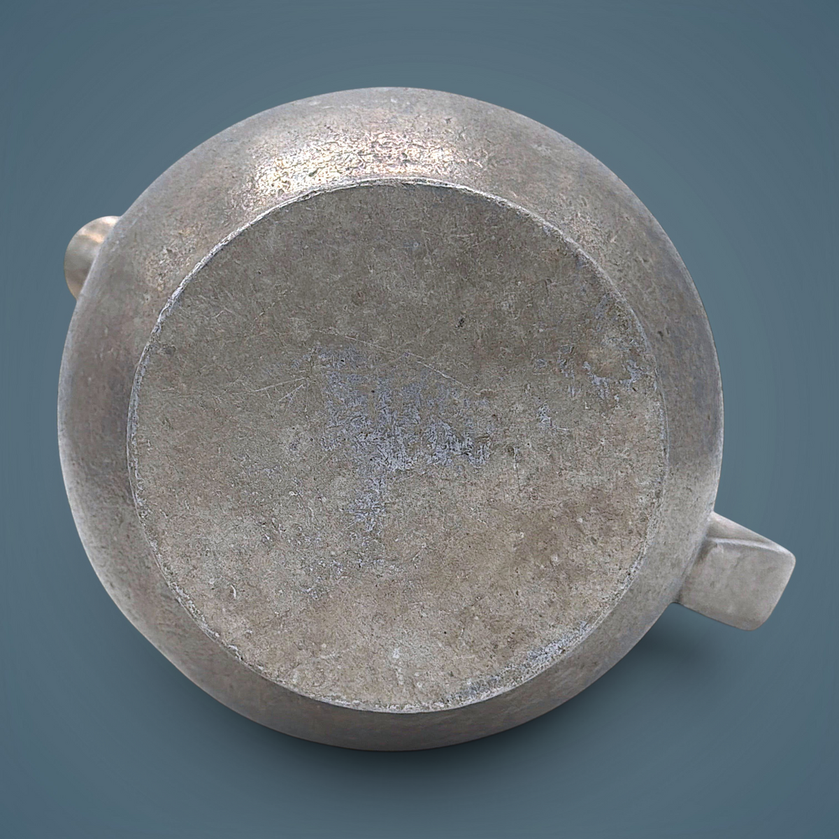 Antique pewter water pitcher in soft gray metal featuring an open flared spout, a bulbous waist with a raised decorative band, and a curved handle. - Photo 3