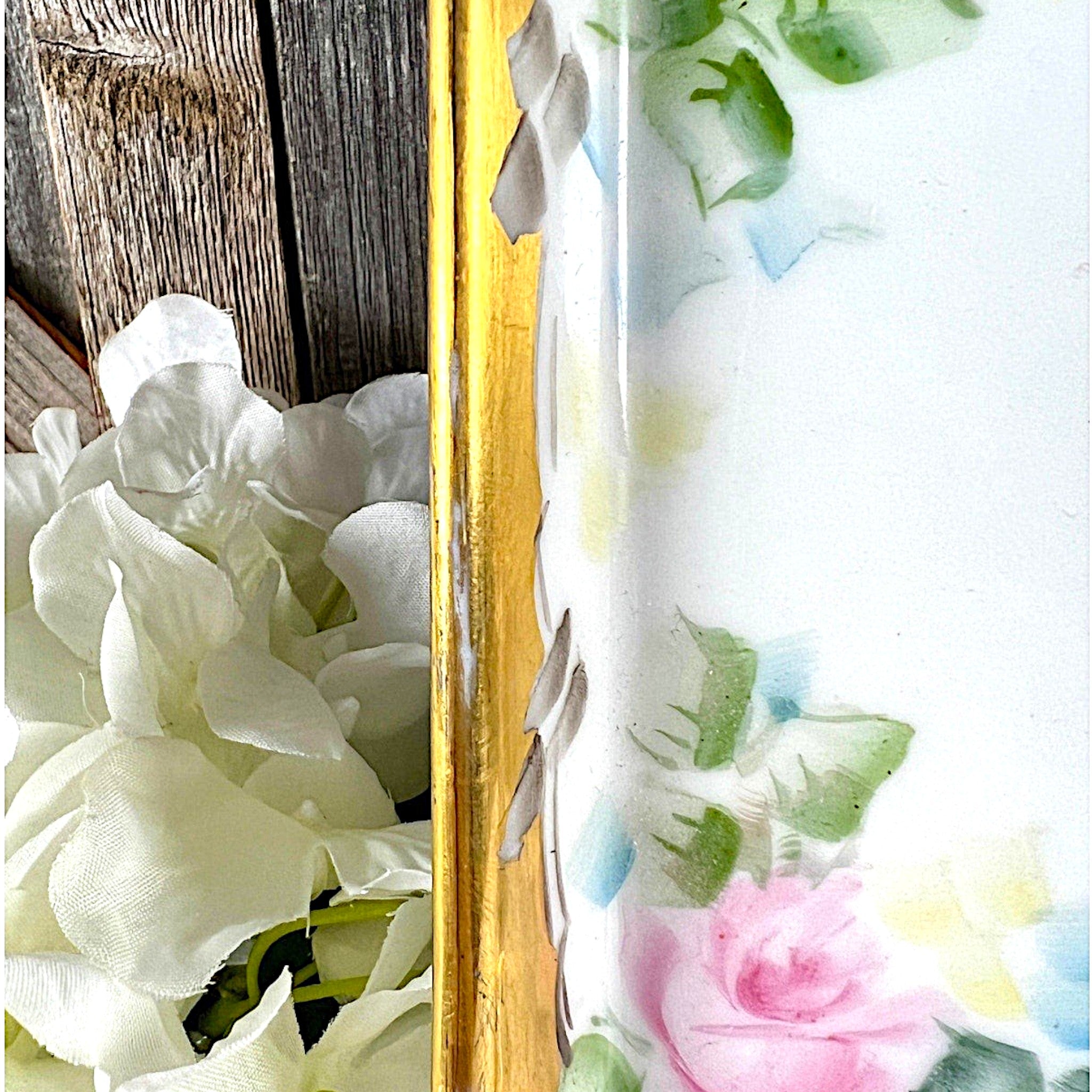 An antique white porcelain octagonal serving platter featuring a delicate gold-gilded rim, presented on a display stand among green foliage. - Photo 5