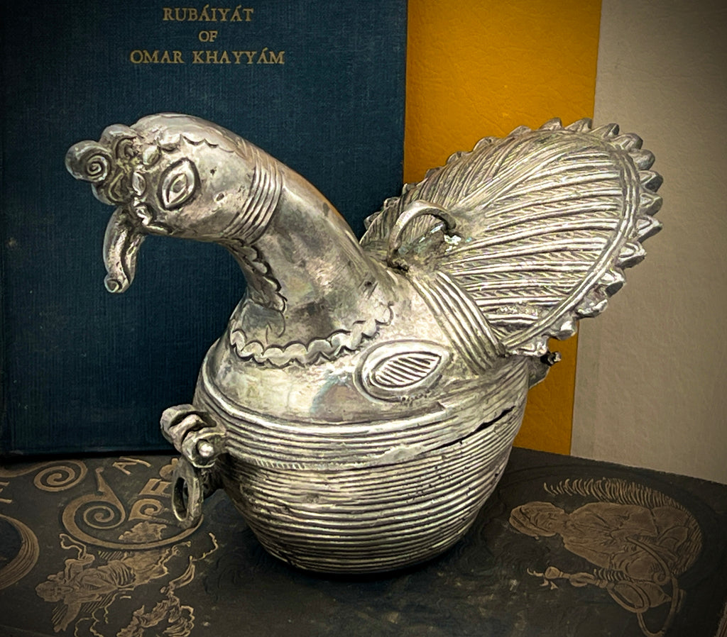 Antique silver-toned, horn-shaped metal vessel shown from a top-down angle with its hinged lid open, revealing a heavily patinated interior with hints of verdigris oxidation. - Photo 2