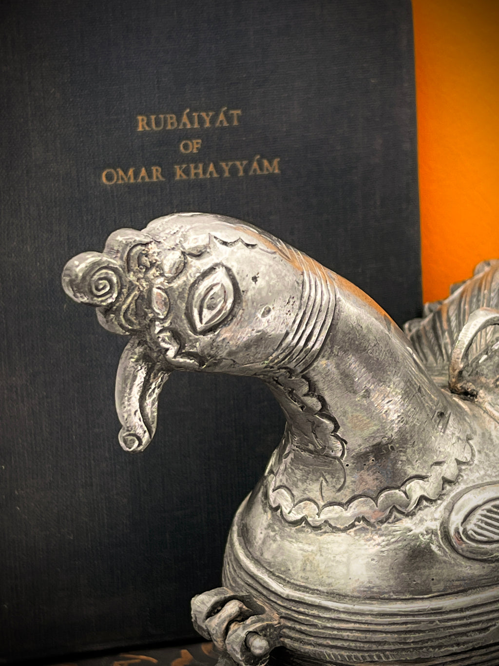 Antique silver-toned, horn-shaped metal vessel shown from a top-down angle with its hinged lid open, revealing a heavily patinated interior with hints of verdigris oxidation. - Photo 4