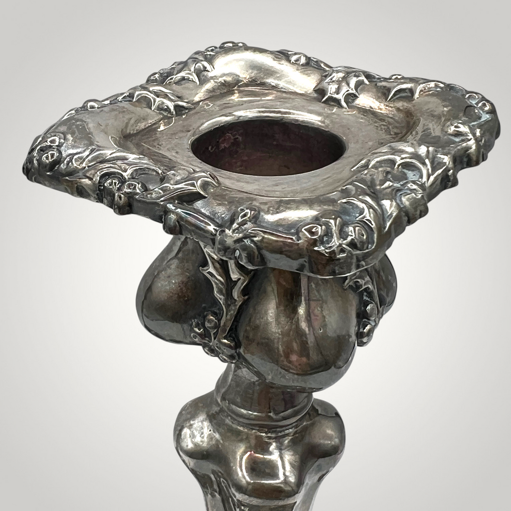 Pair of antique Victorian quadruple silverplate candlesticks with embossed holly leaf and berry relief borders on square contoured bases and fluted stems. - Photo 3