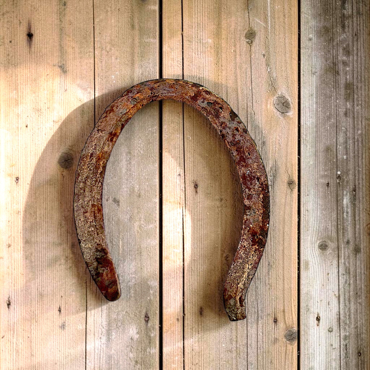 Antique authentic rusted iron horseshoe with heavy weathered patina and nail holes - Photo 1