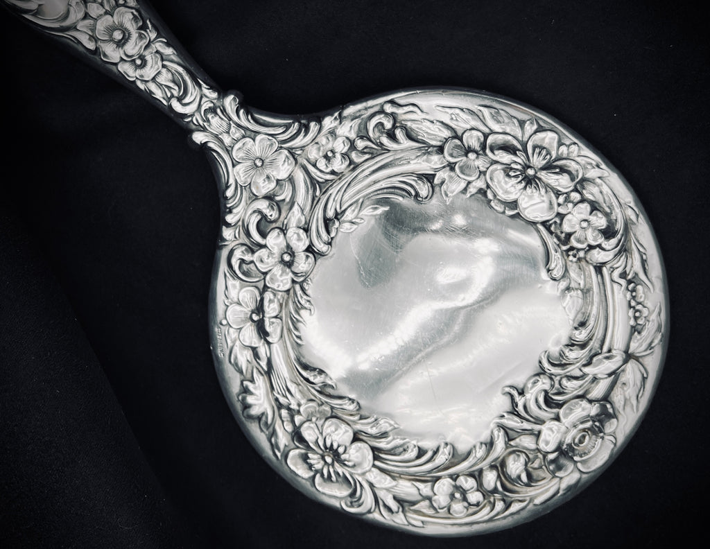 Antique Sterling Silver Handheld Mirror with Ornate Floral Design