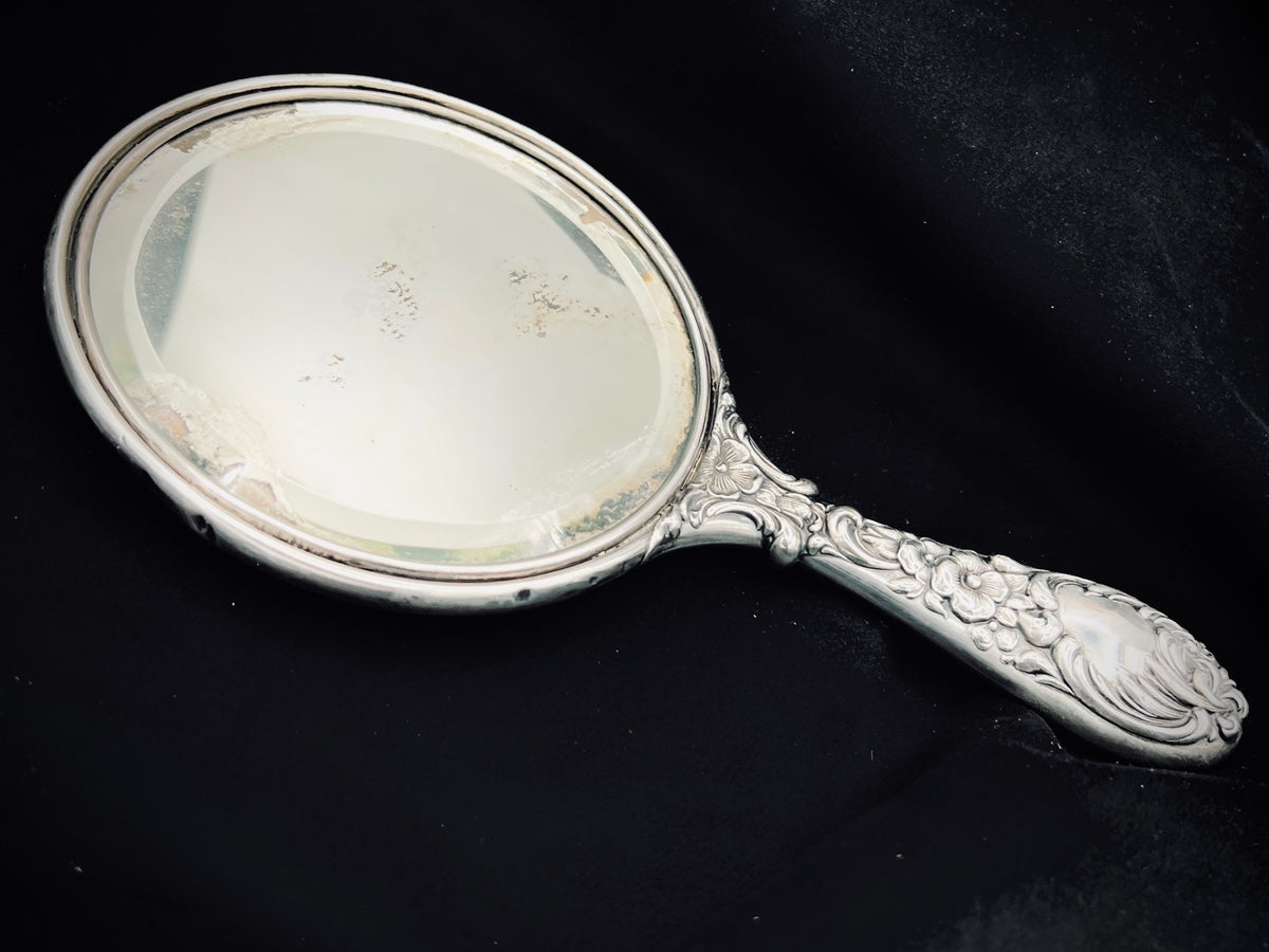 Antique Sterling Silver Handheld Mirror with Ornate Floral Design
