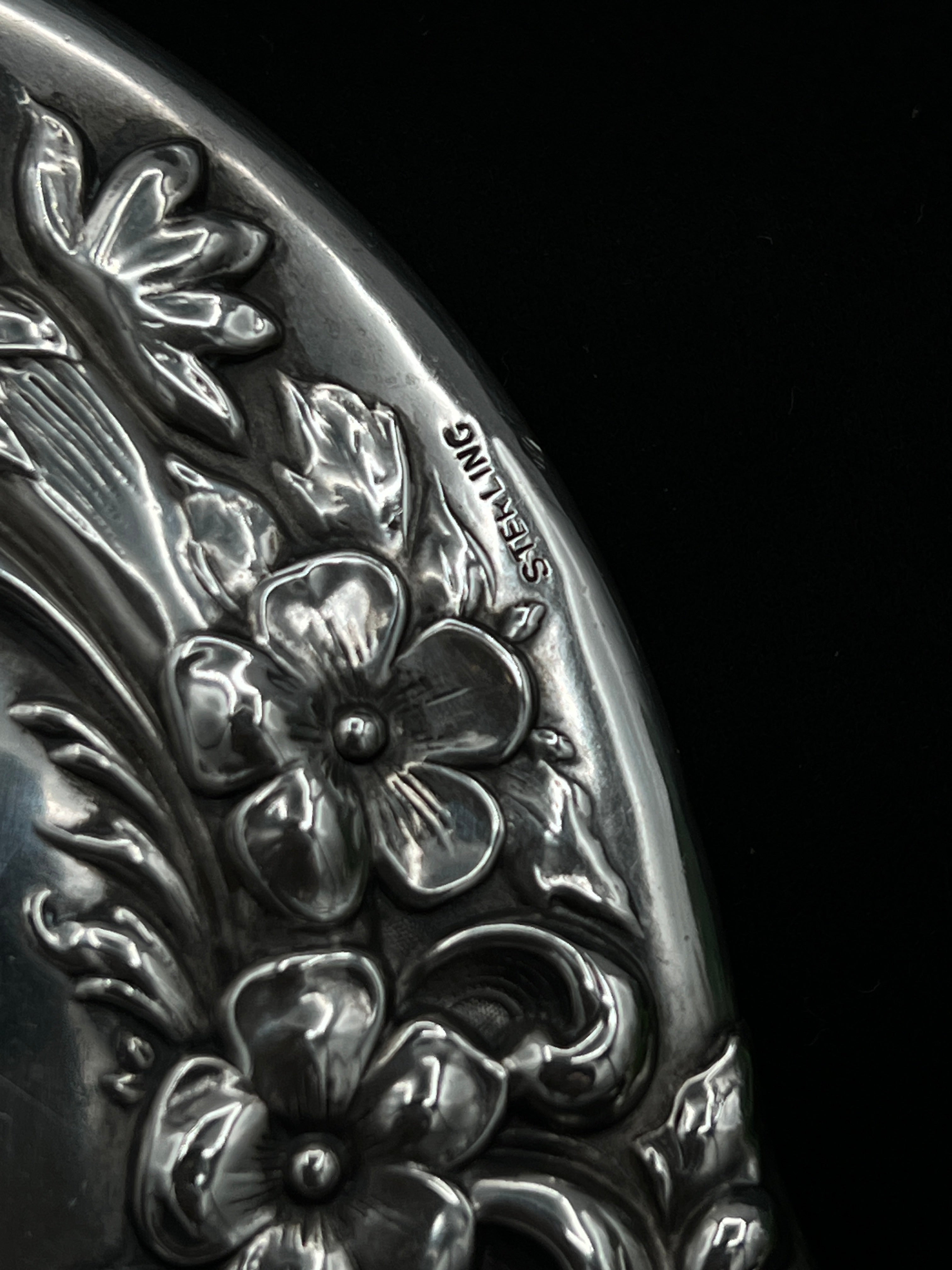 Antique Sterling Silver Handheld Mirror with Ornate Floral Design