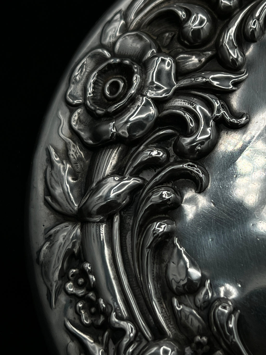 Antique Sterling Silver Handheld Mirror with Ornate Floral Design