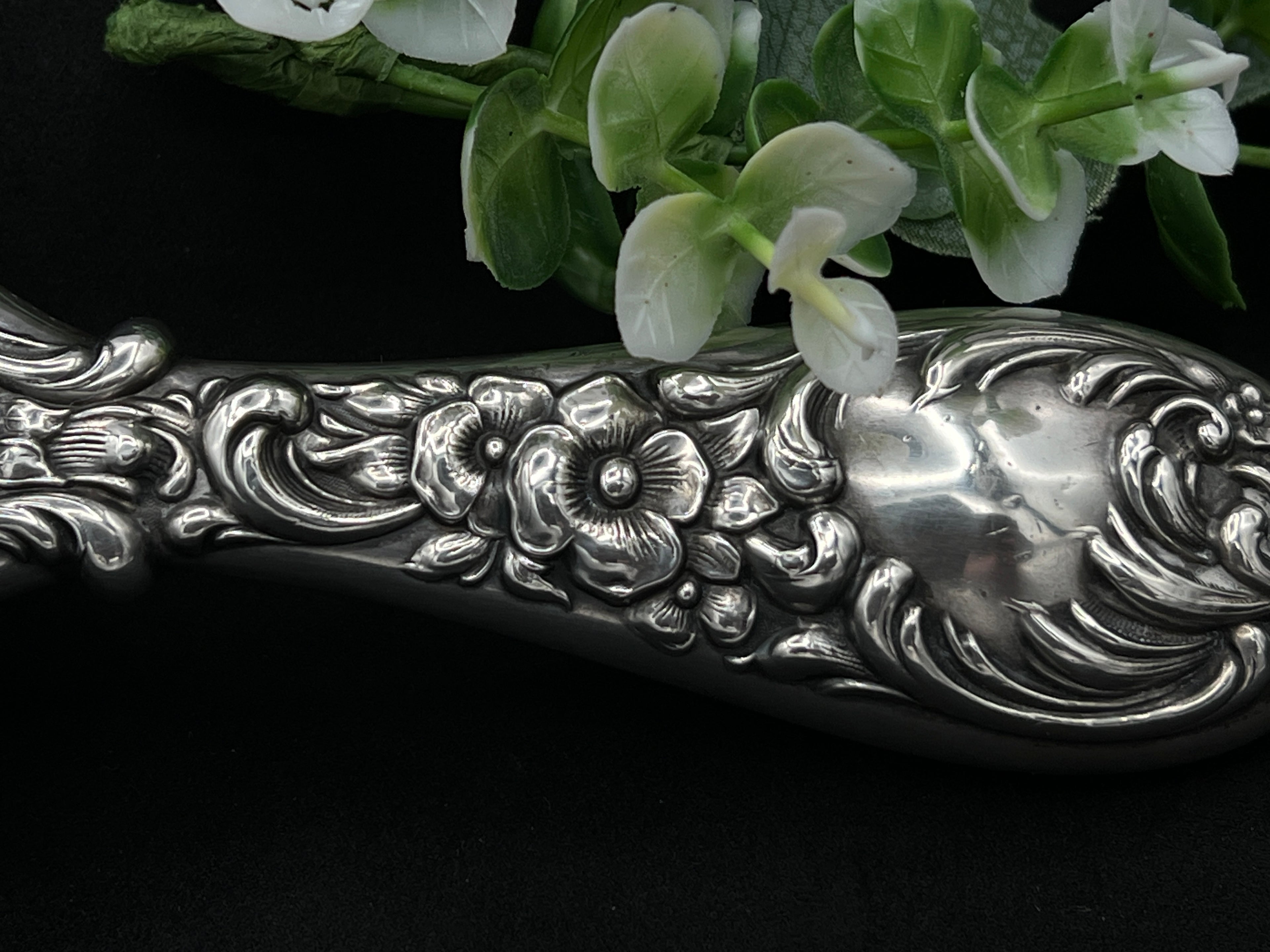 Antique Sterling Silver Handheld Mirror with Ornate Floral Design