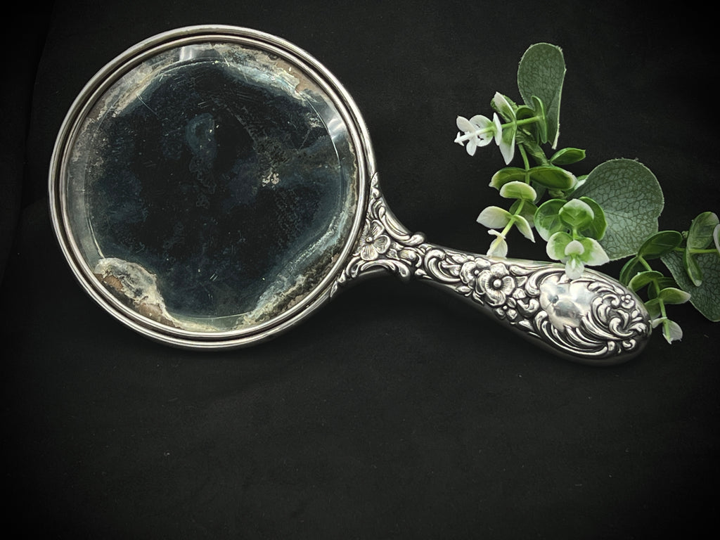 Antique Sterling Silver Handheld Mirror with Ornate Floral Design