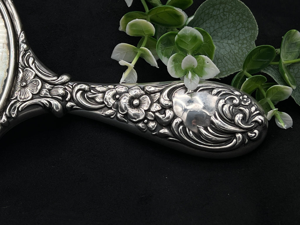 Antique Sterling Silver Handheld Mirror with Ornate Floral Design