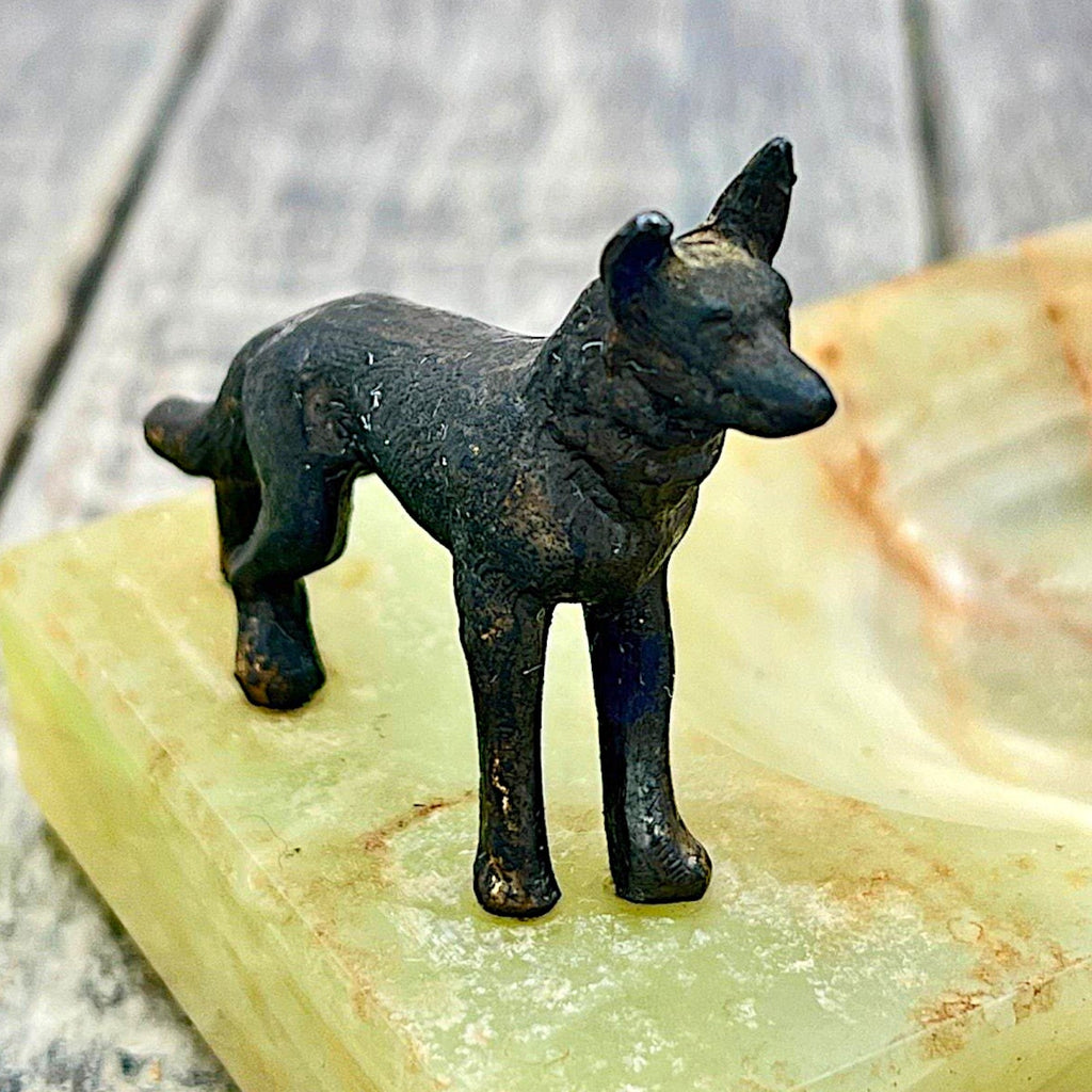 An Art Deco green onyx trinket dish featuring a detailed dark patinated metal figurine of a standing German Shepherd dog mounted on the corner of the polished translucent green stone base. - Photo 3