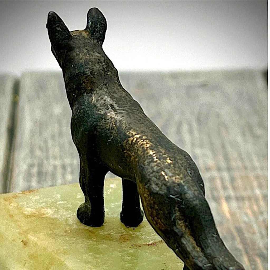 An Art Deco green onyx trinket dish featuring a detailed dark patinated metal figurine of a standing German Shepherd dog mounted on the corner of the polished translucent green stone base. - Photo 6