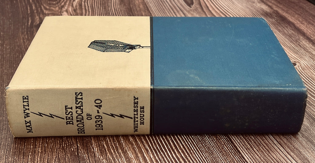 Hardcover book Best Broadcasts of 1939-40 featuring a two-tone cloth binding with an off-white upper half depicting a black line art radio microphone above a solid navy blue lower cloth cover. - Photo 3