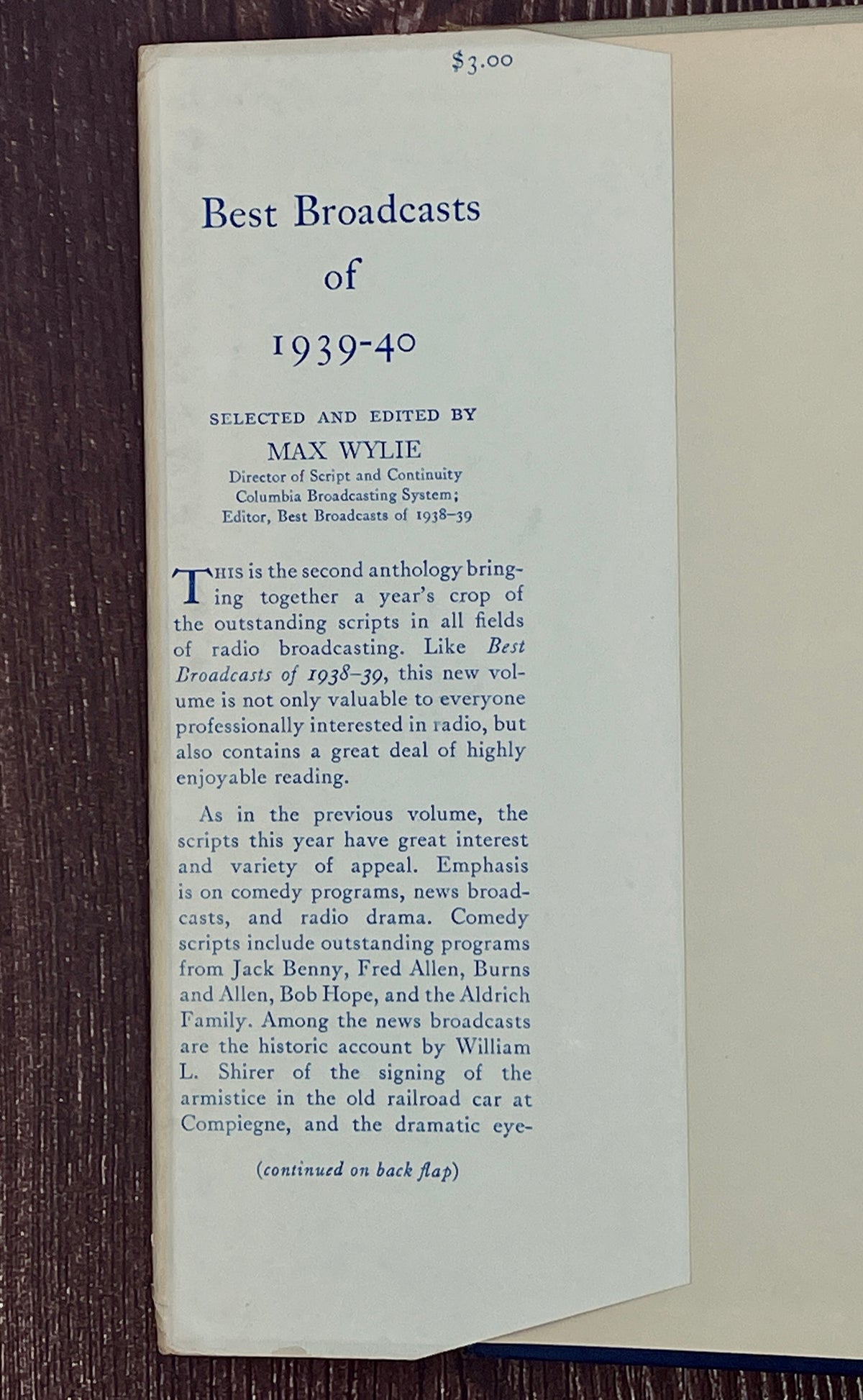 Hardcover book Best Broadcasts of 1939-40 featuring a two-tone cloth binding with an off-white upper half depicting a black line art radio microphone above a solid navy blue lower cloth cover. - Photo 4