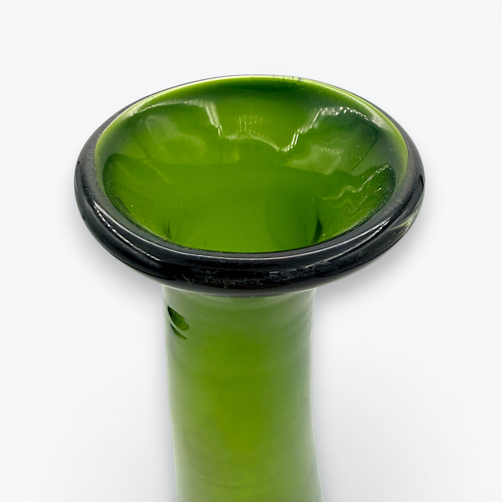 A tall, tapered mid-century green glass decanter with a flared rim and cork stopper, standing against a clean white background. - Photo 4