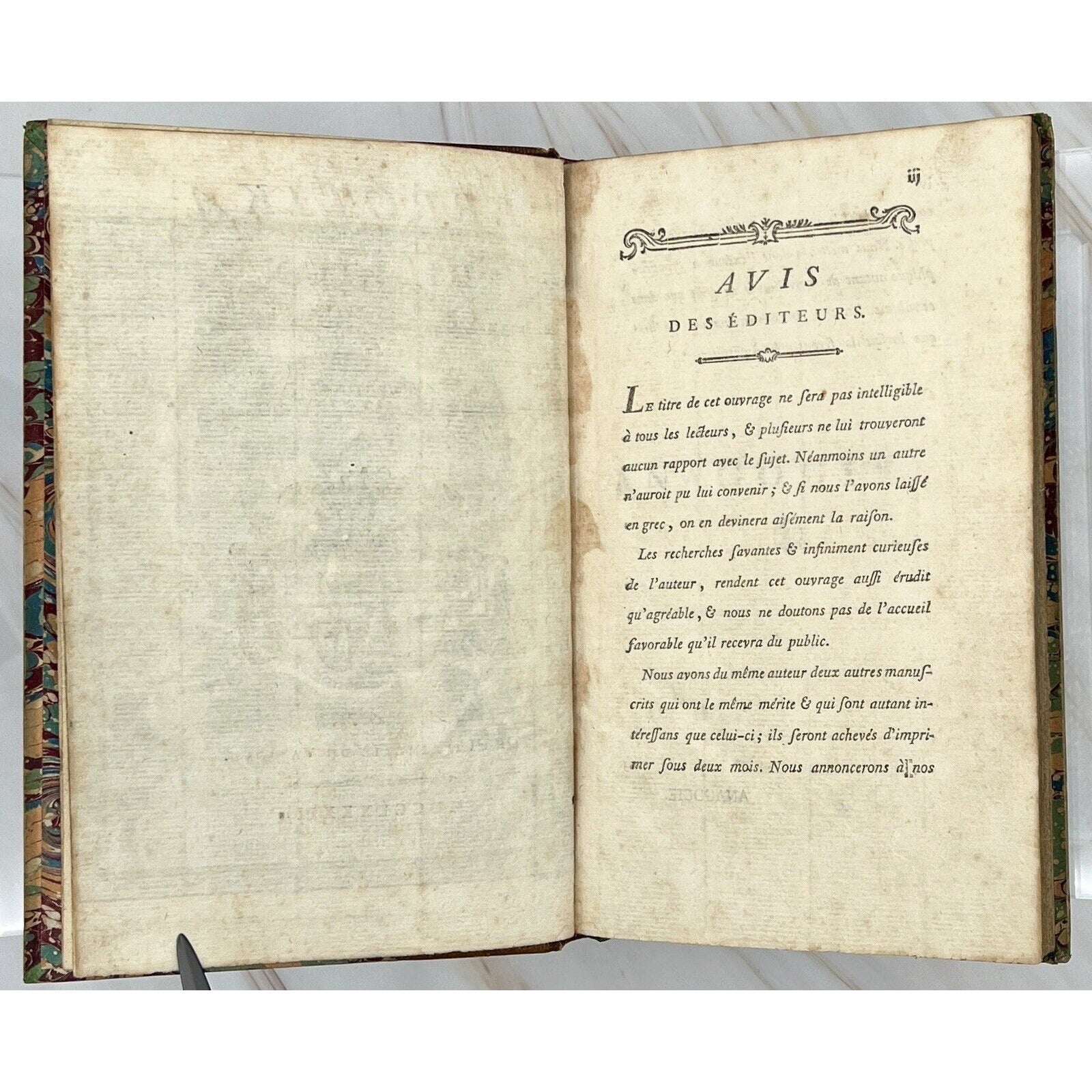 Open 1783 Errotika Biblion by Mirabeau, antique French erotica, editors' notice page, marbled cover.