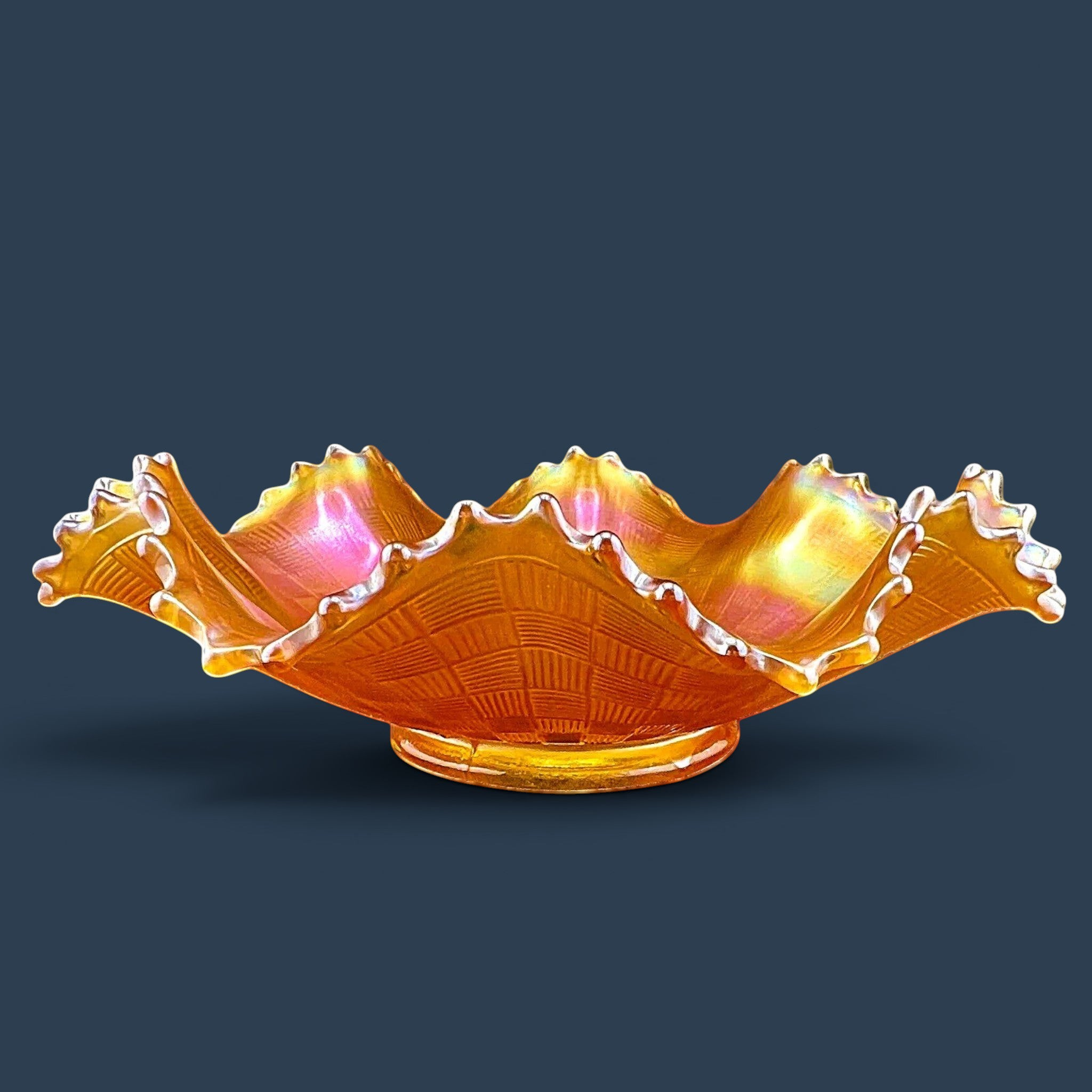 Fenton marigold carnival glass ruffled bowl featuring an iridescent finish and basketweave pattern. - Photo 1