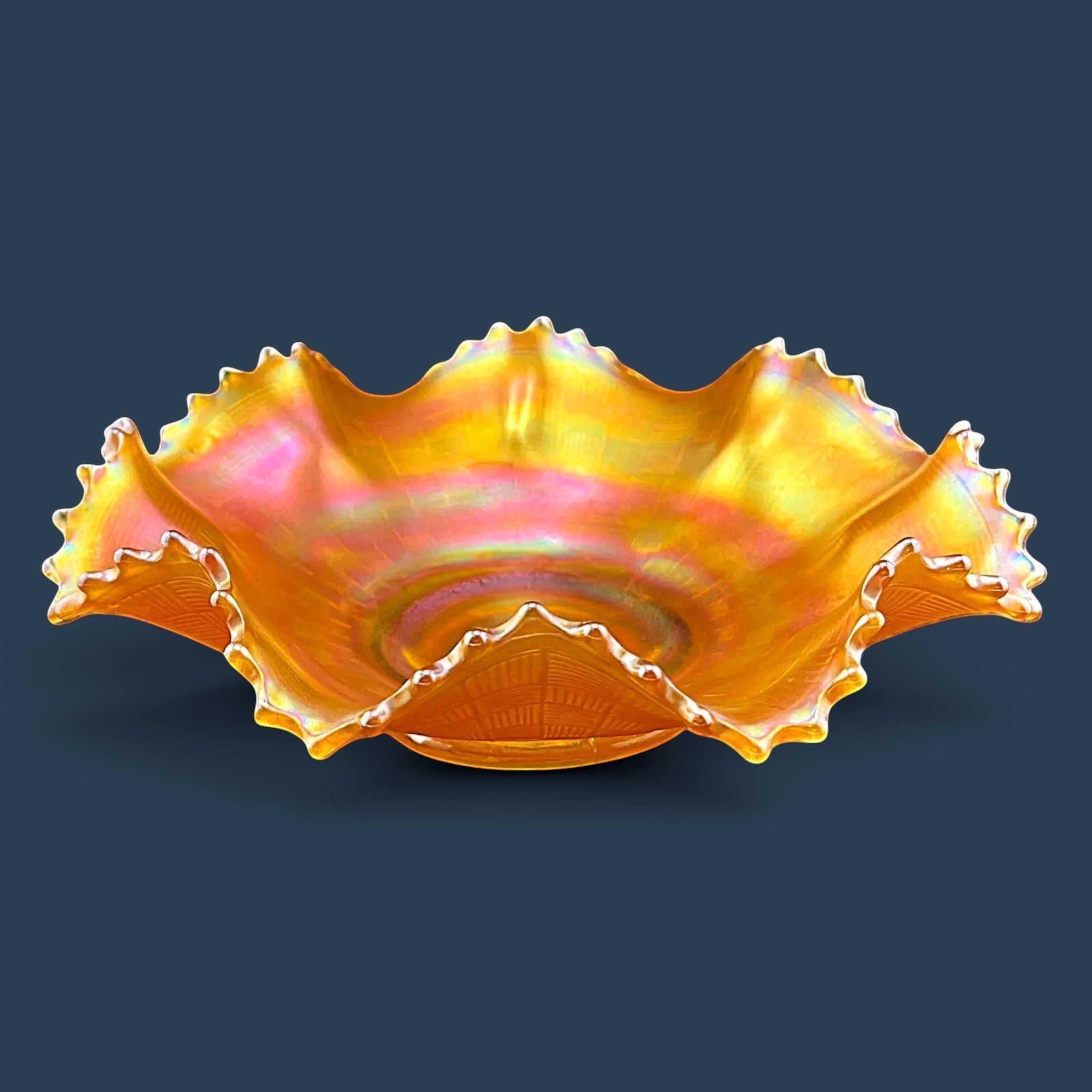 Fenton marigold carnival glass ruffled bowl featuring an iridescent finish and basketweave pattern. - Photo 2