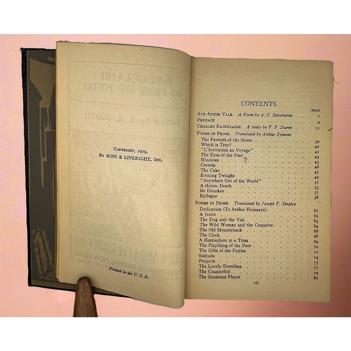 A vintage black leatherette bound book titled Baudelaire His Prose and Poetry from the Modern Library against a soft background. - Photo 6