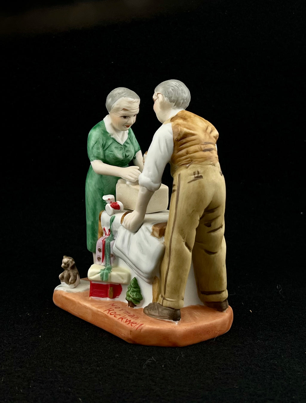 Norman Rockwell 1980's Porcelain Statue "Wrapping Christmas Presents"