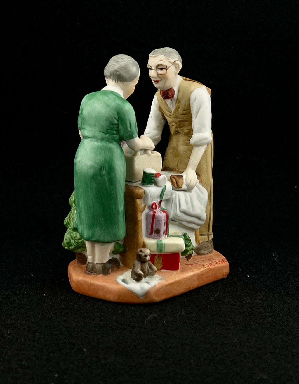 Norman Rockwell 1980's Porcelain Statue "Wrapping Christmas Presents"