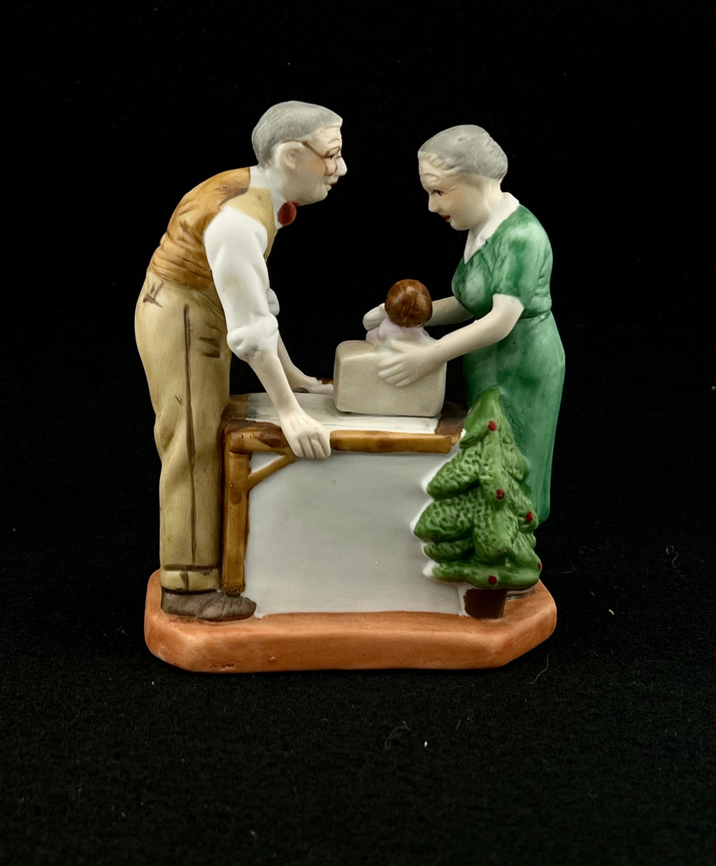 Norman Rockwell 1980's Porcelain Statue "Wrapping Christmas Presents"