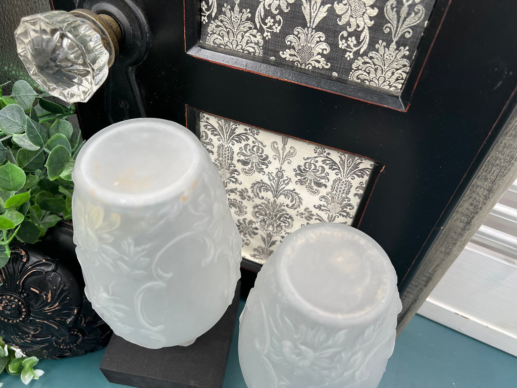 Patina & Prose pair of antique white camphor glass vases with relief floral pattern, 8-inch height, French Art Nouveau style.