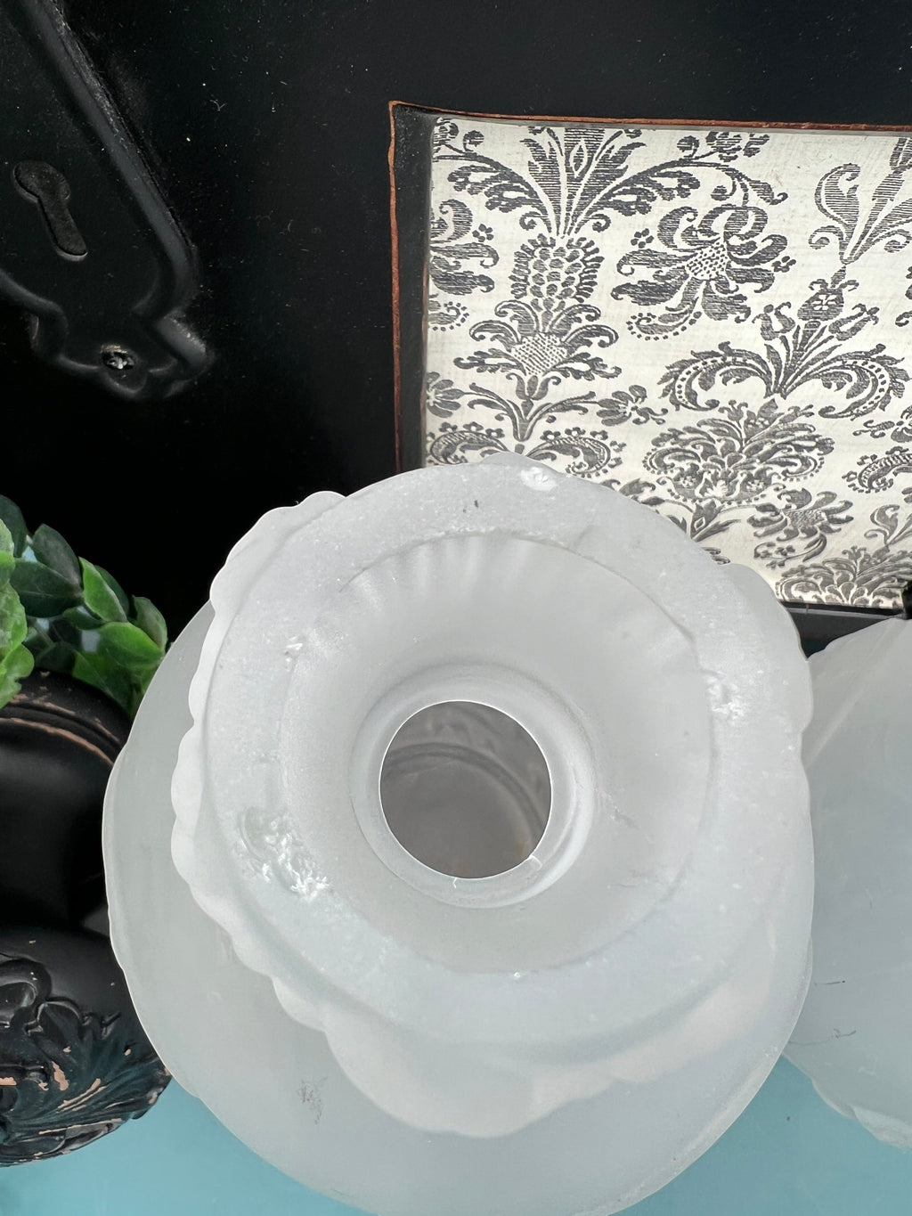 Patina & Prose pair of antique French camphor glass vases with relief floral details and frosted finish.