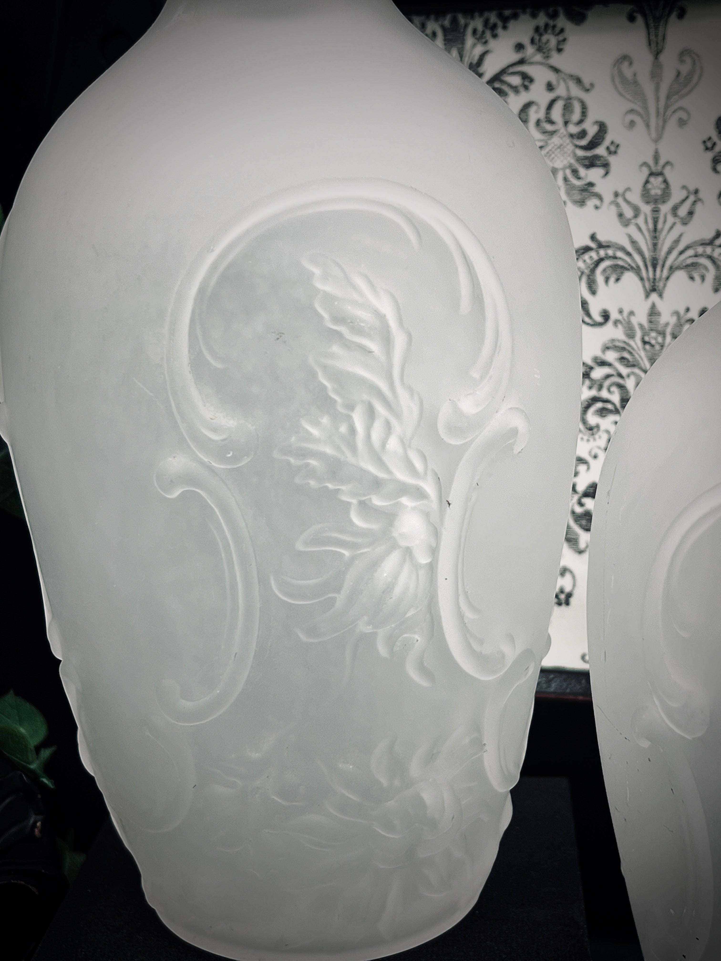 Patina & Prose pair of antique French camphor glass vases with relief floral chrysanthemum pattern, acid-etched frosted finish.