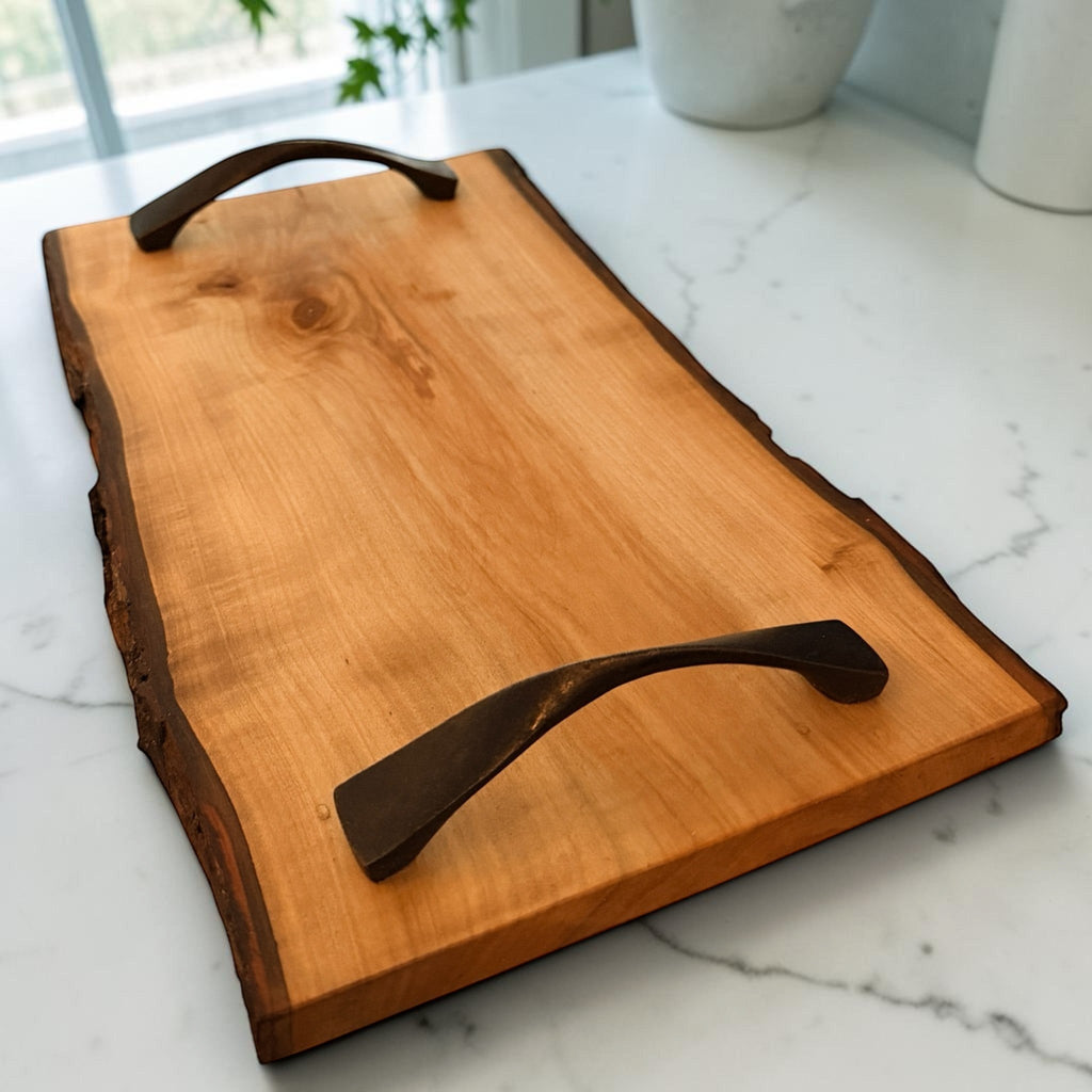 Patina & Prose live edge cherry wood serving tray with dark metal handles, 13.5-inch, natural bark edge.