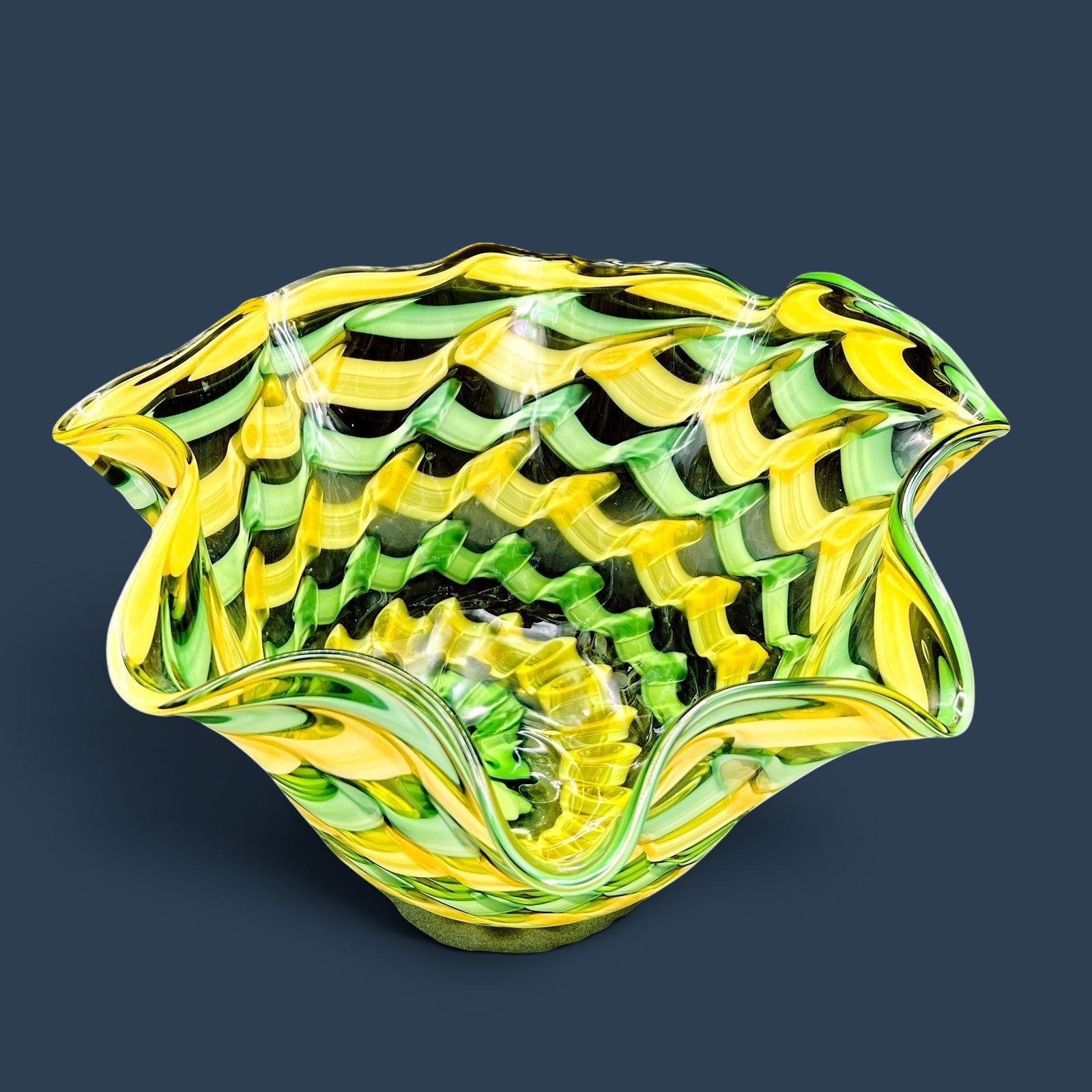 Patina & Prose handblown glass handkerchief bowl with yellow and green ribbon design. Midcentury style decorative centerpiece.